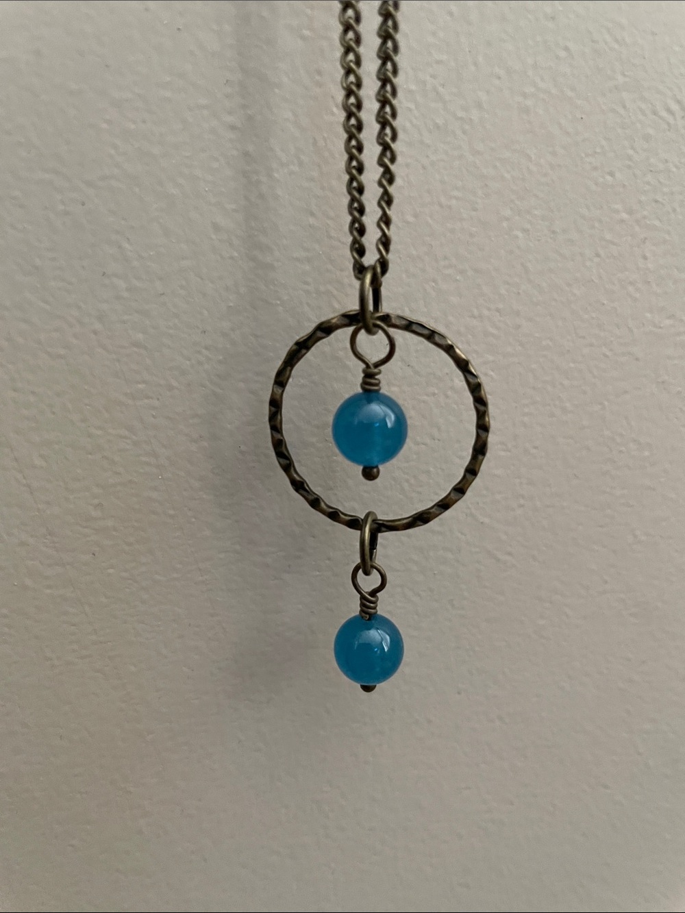 Brass crimped hoop steel blue jade round gemstone necklace